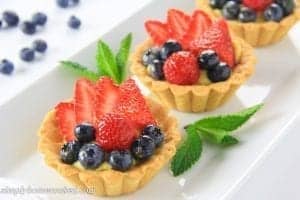 fruit tarts with strawberries and blueberries