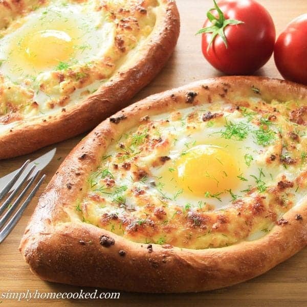 Khachapuri. Cheese and egg in a bread boat