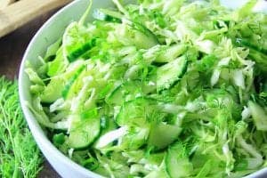 Cabbage Cucumber Salad in a white bowl