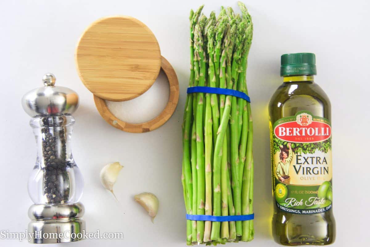 Quick, easy, and healthy sautéed garlic asparagus. A simple and delicious side to almost any meal. #healthysides #garlicasparagus #asparagus #vegetablesides #paleosides #whole30sides #ketosides pepper, salt, garlic, olive oil, and asparagus