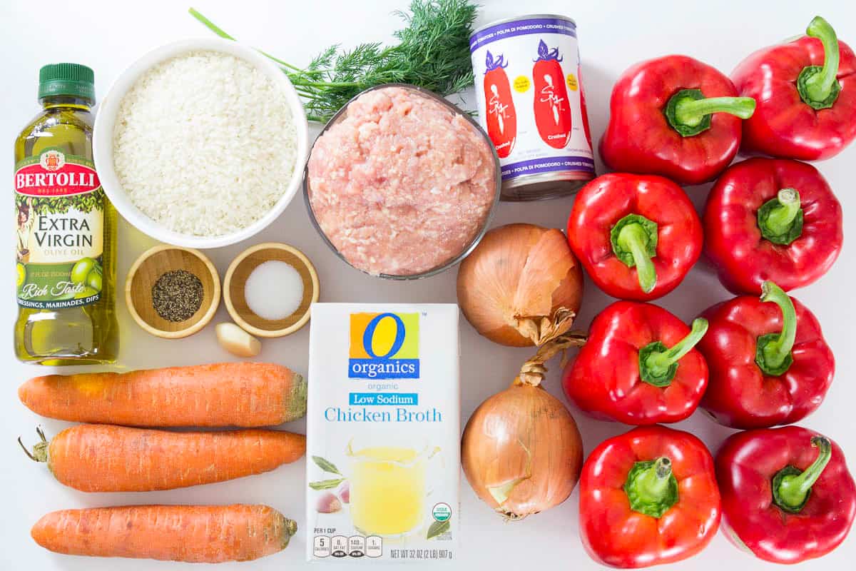 an overhead photo of ingredients needed for rice and chicken stuffed bell pepper