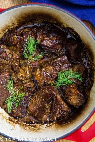 Braised Beef with fresh dill in a dutch oven pot