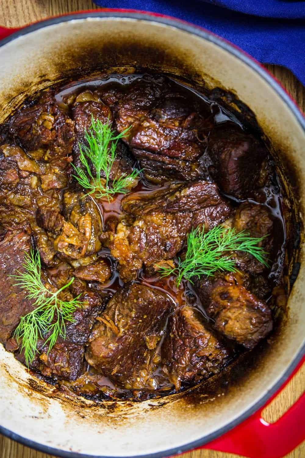 braised beef in a dutch oven pot