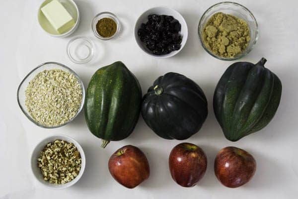 an overhead image of ingredients needed to make stuffed acorn squash for breakfast