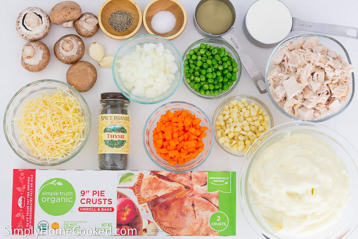 an overhead image of turkey shepherds pie ingredients on a white background