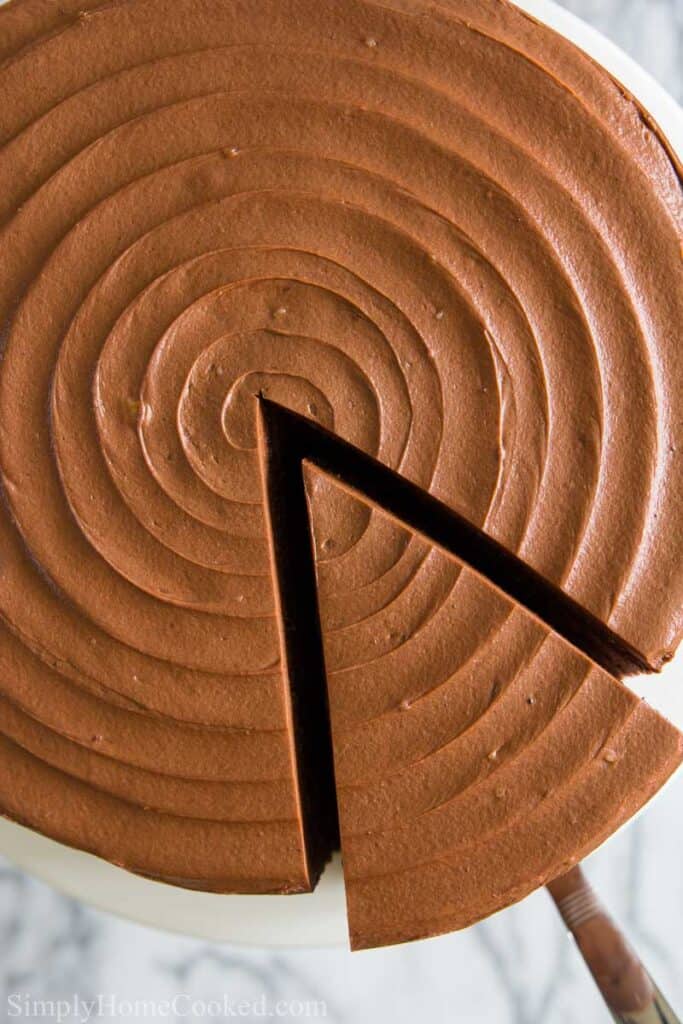 Overhead view of Nutella Cake with a slice being removed