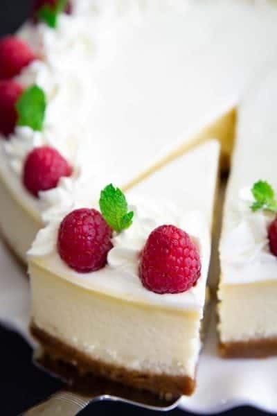 white cheesecake with raspberries
