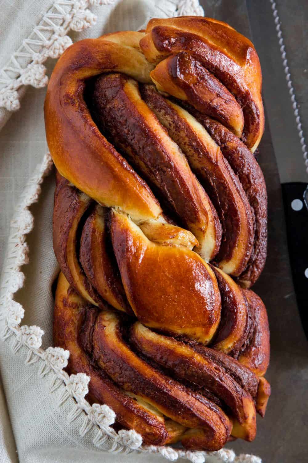 A golden brown crust is the epitome of deliciousness in this simple to follow Nutella Brioche Bread Recipe chock full of hazelnut and chocolate spread and buttery goodness. 