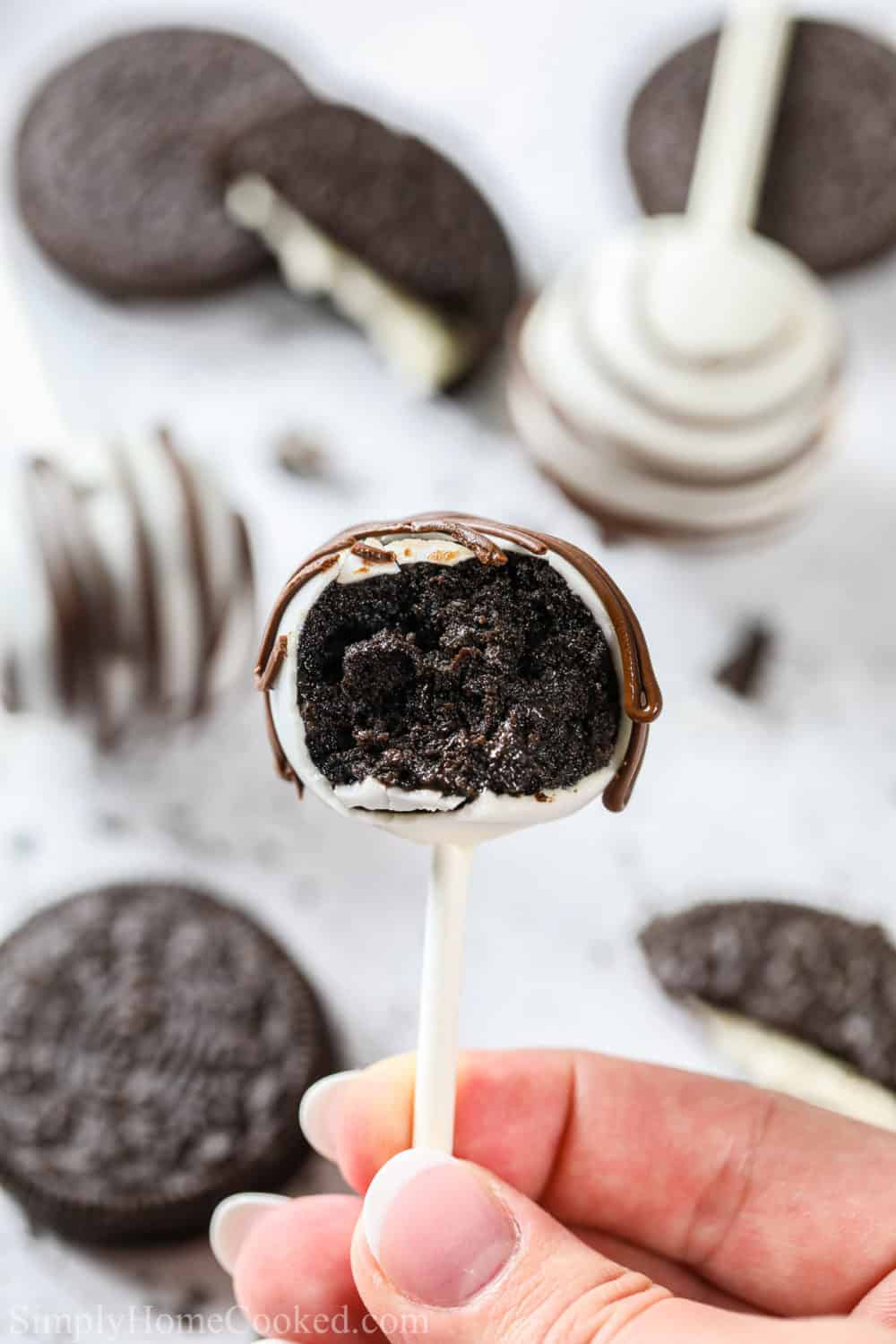 close up image of a bitten Oreo cake pop