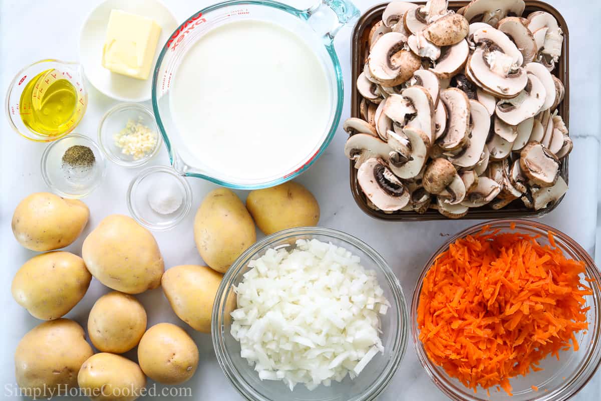 Ingredients for Potatoes with Mushroom Gravy, including potatoes, mushrooms, onion, carrot, garlic, butter, heavy cream, olive oil, salt and pepper.