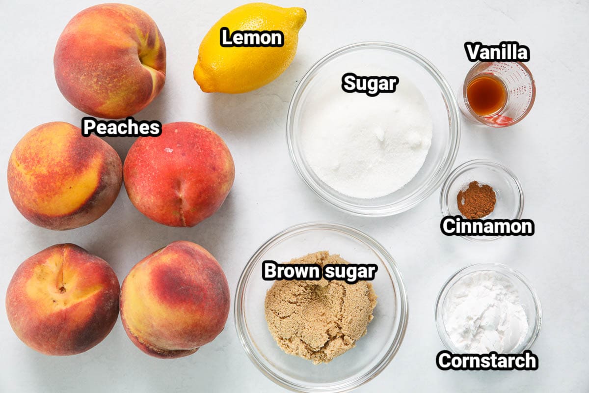 Ingredients for Peach Pie Filling: peaches, lemon, sugar, brown sugar, vanilla, cinnamon, and cornstarch. 