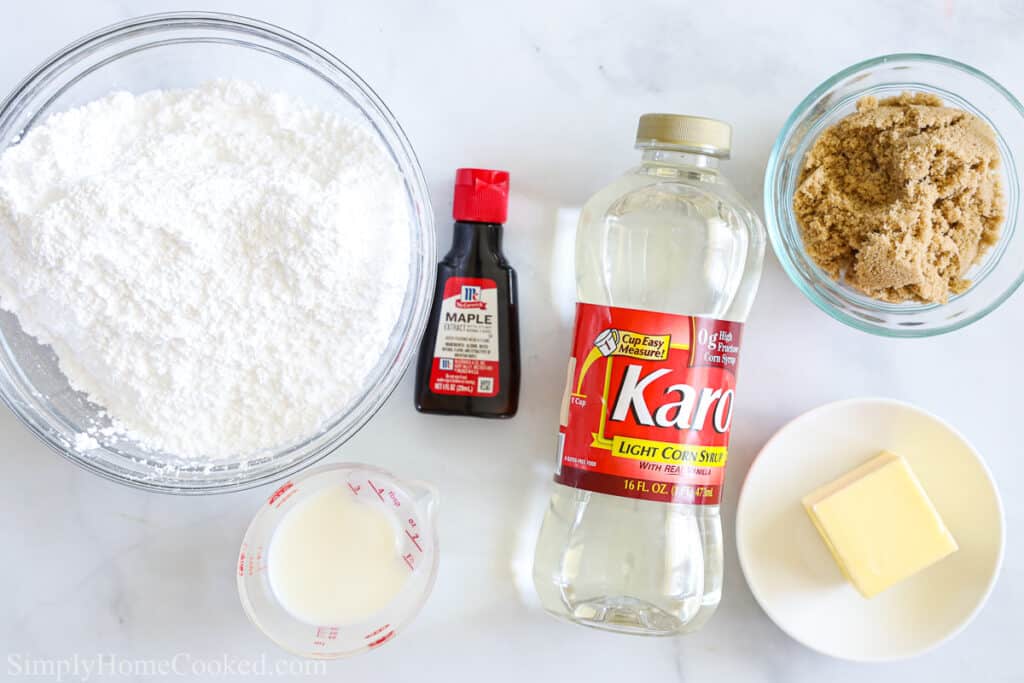 Ingredients for Maple glaze for Maple Donut Bars from Scratch, including powdered sugar, brown sugar, maple extract, corn syrup, butter, and milk.