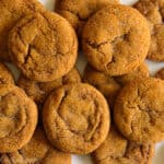 overhead image of chewy ginger molasses cookies overlapping each other