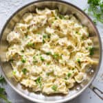 Creamy Tortellini Alfredo in a stainless steal pan
