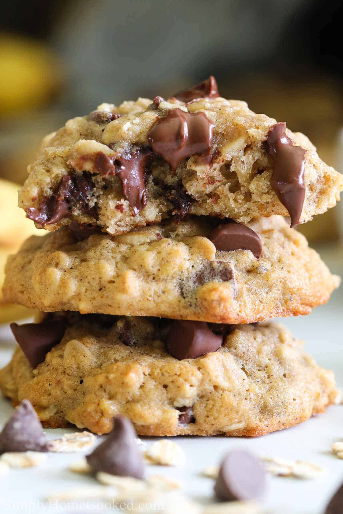 close up image of a stack of banana oatmeal chocolate chip cookies