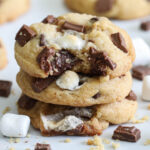 Square image of S'mores Cookies stacked with a bite missing