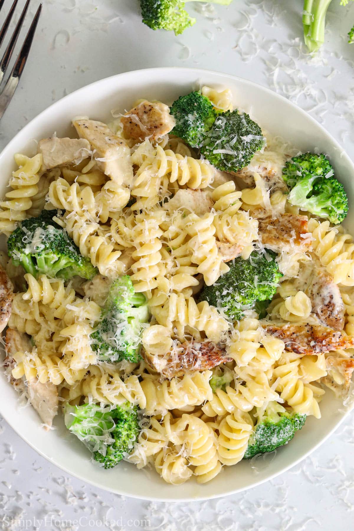 Vertical image of Chicken Broccoli Alfredo on a plate