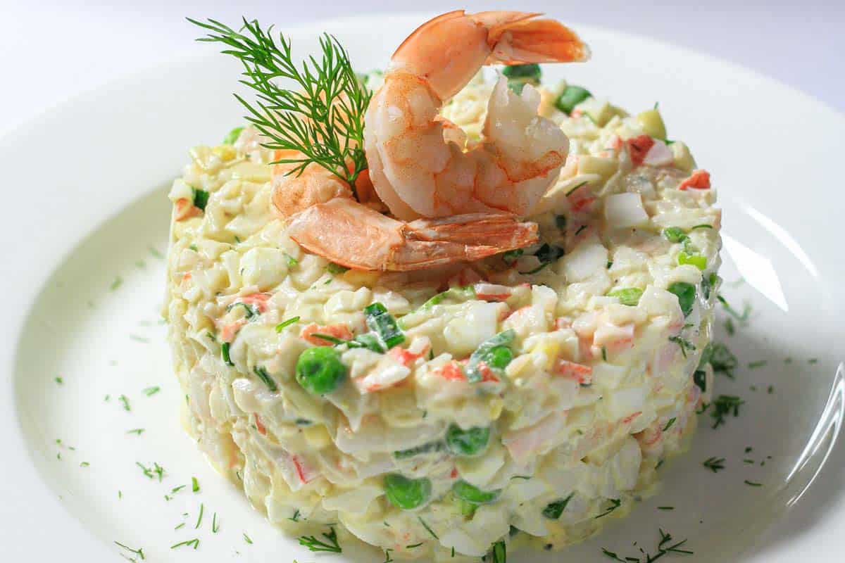 Crab Salad molded and topped with shrimp and dill