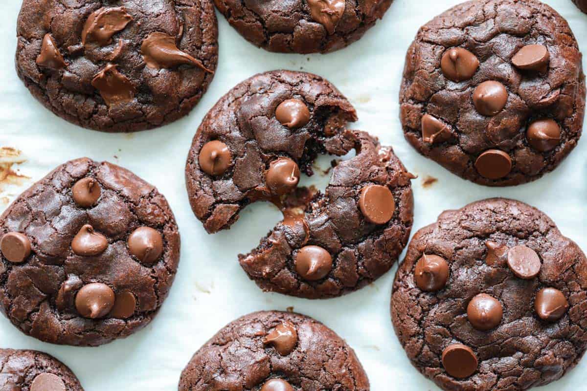 Horizontal image of Double Chocolate Cookies, one pulled apart