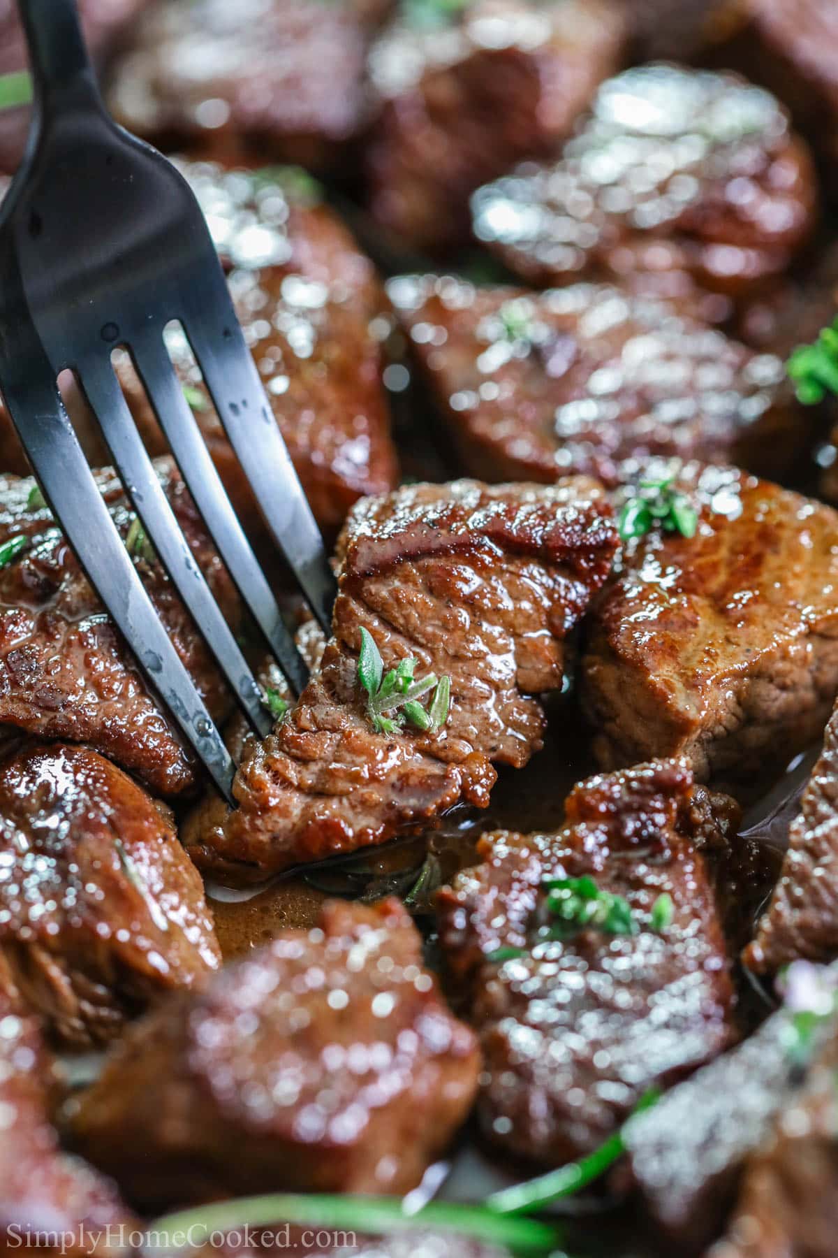 Garlic Butter Steak Bites and a fork