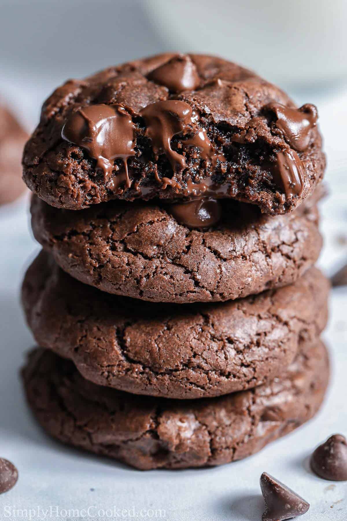 Close up of a stack of Double Chocolate Cookies, one missing a bite