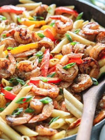 close up image of shrimp rasta pasta in a pan