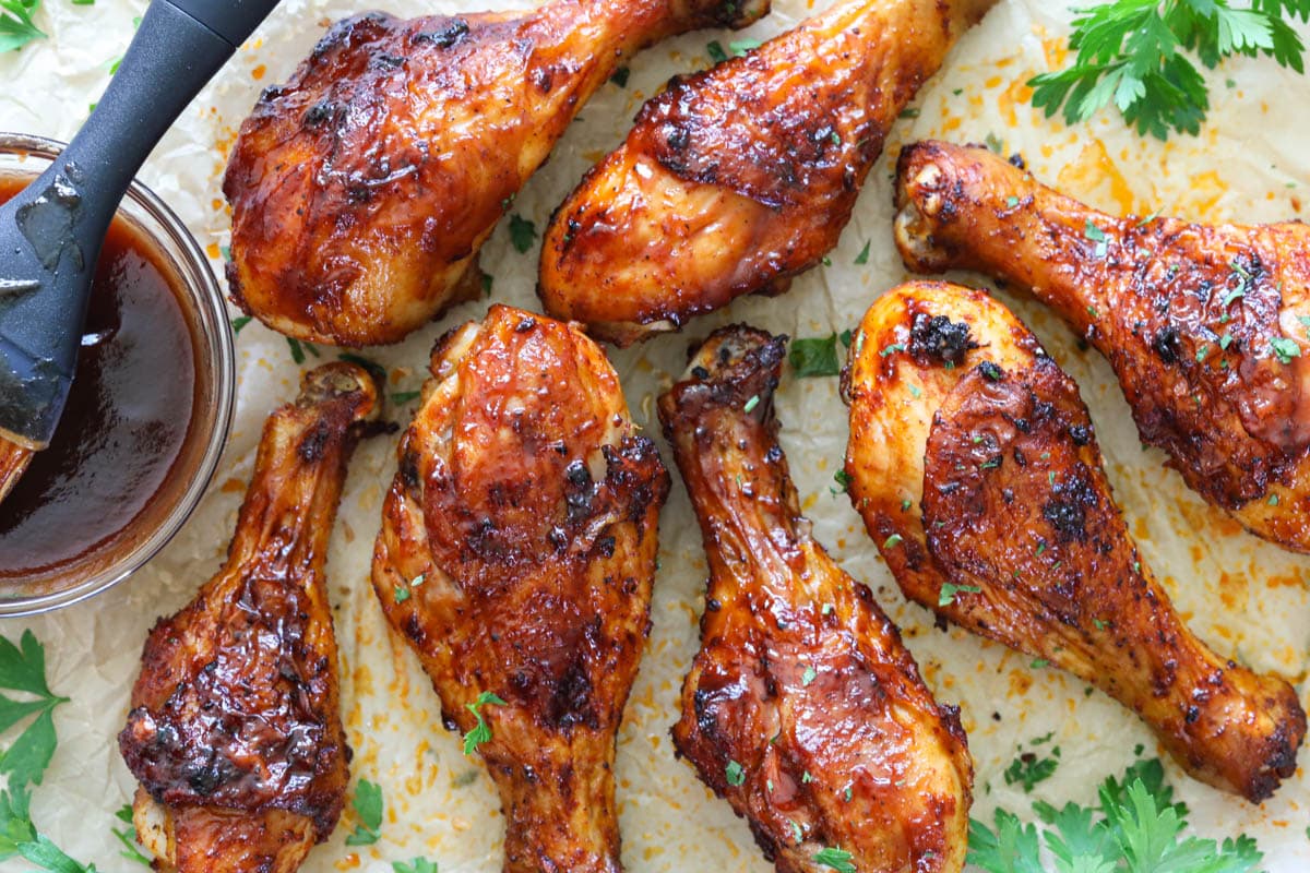 Horizontal image of Air Fryer Chicken Legs with BBQ sauce
