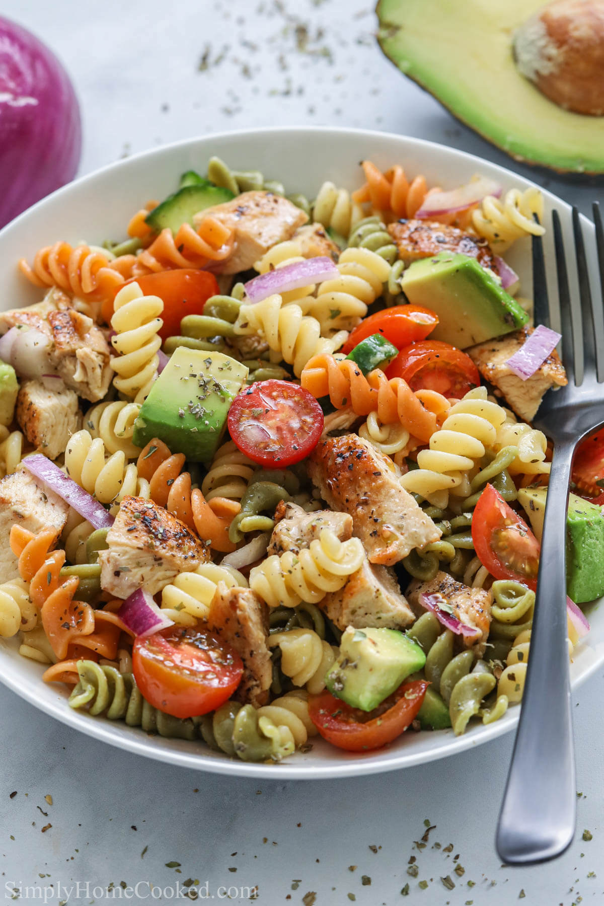 Chicken Pasta Salad in a bowl with a fork.