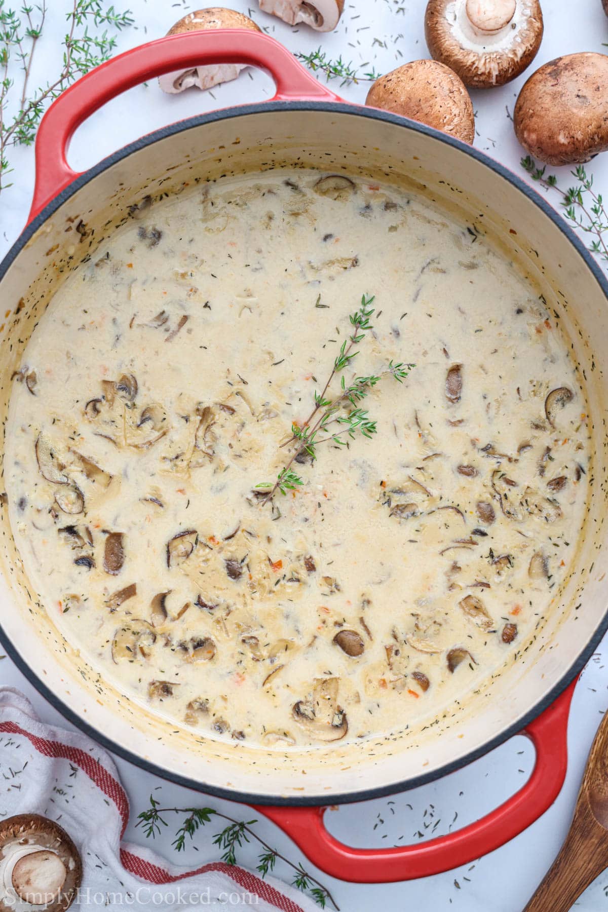 Vertical image of Cream of Mushroom Soup in a pot