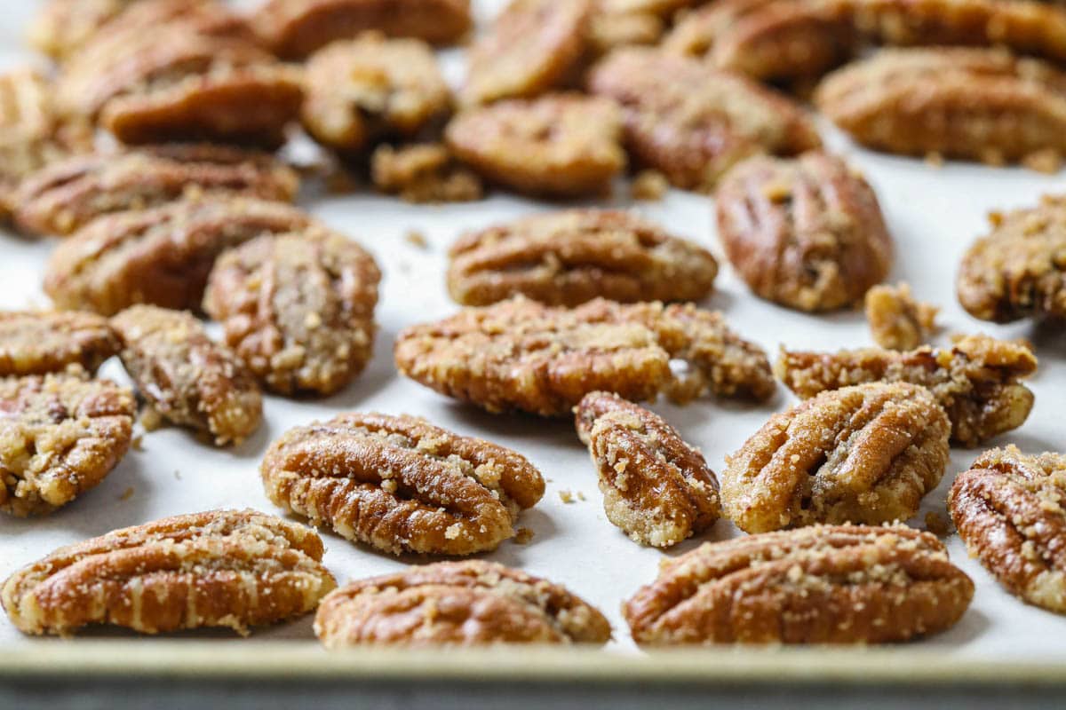 Horizontal image of Candied Pecans on a baking sheet.