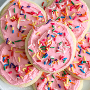 overhead image lofthouse frosted sugar cookies with rainbow sprinkles