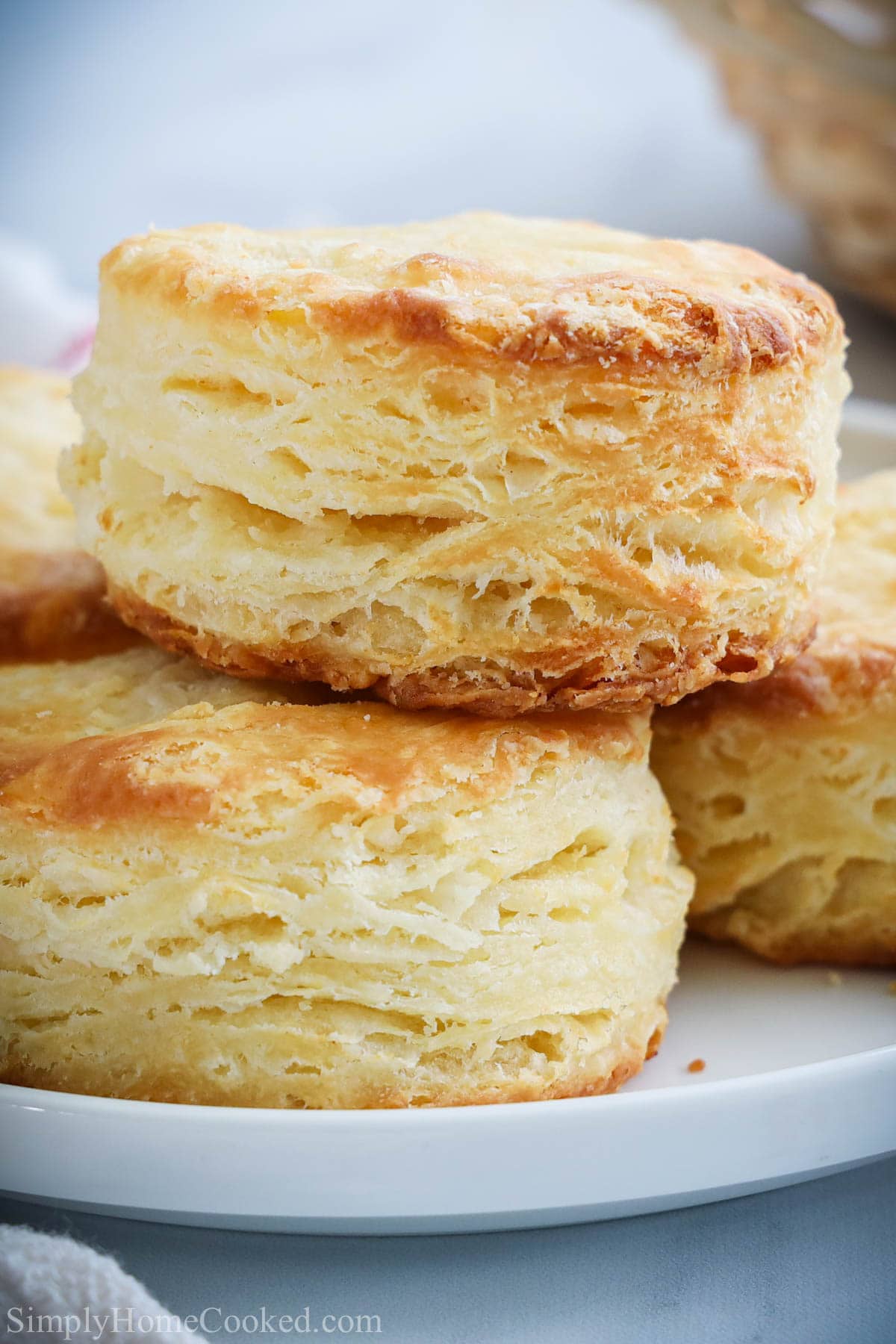 a stack of flakey buttermilk biscuits 