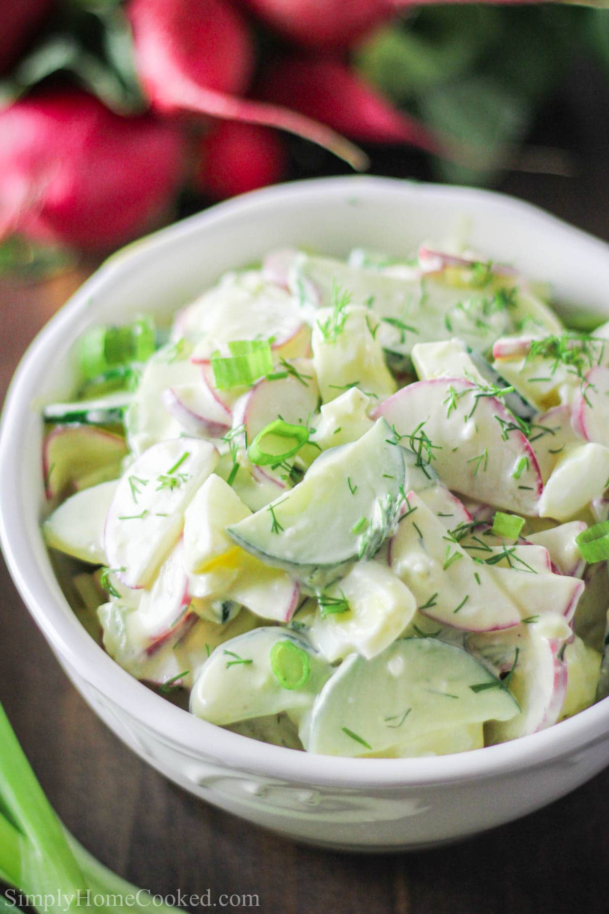 Cucumber Radish Salad in a white bowl