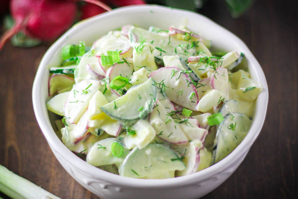 White bowl of Cucumber Radish Salad