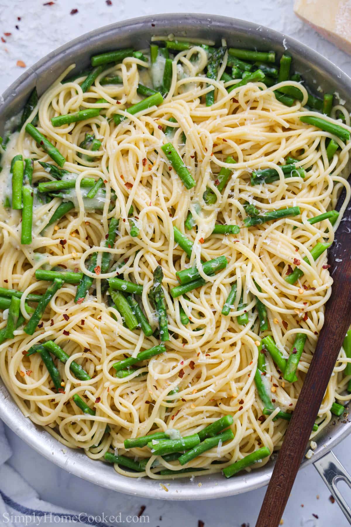 https://simplyhomecooked.com/wp-content/uploads/2022/03/asparagus-pasta-2.jpg