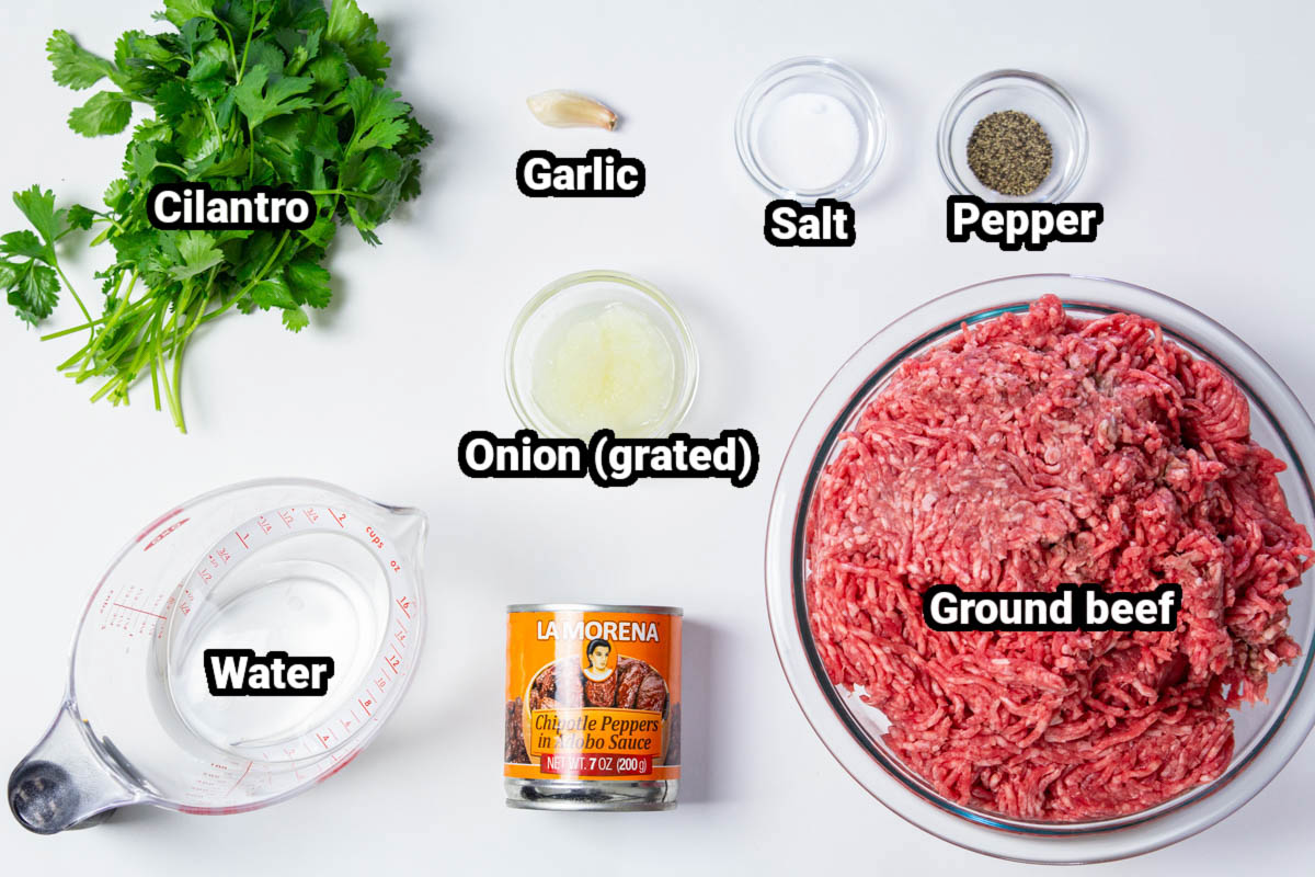 Ingredients for Spicy Chipotle Burgers with Avocado Sauce: ground beef, cilantro, garlic, onion, water, chipotle peppers, salt, and pepper.