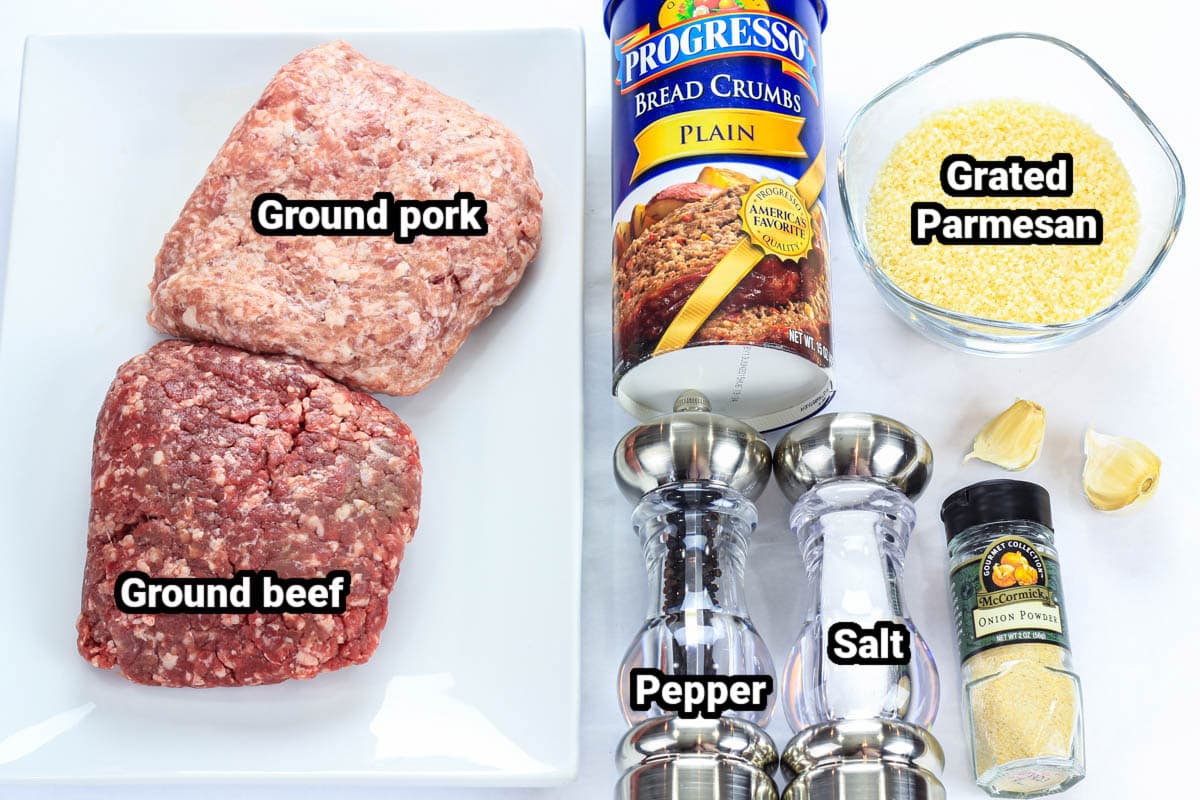 Ingredients for Grilled BBQ Meatballs: ground pork, ground beef, breadcrumbs, grated Parmesan, garlic powder, garlic, salt, and pepper.