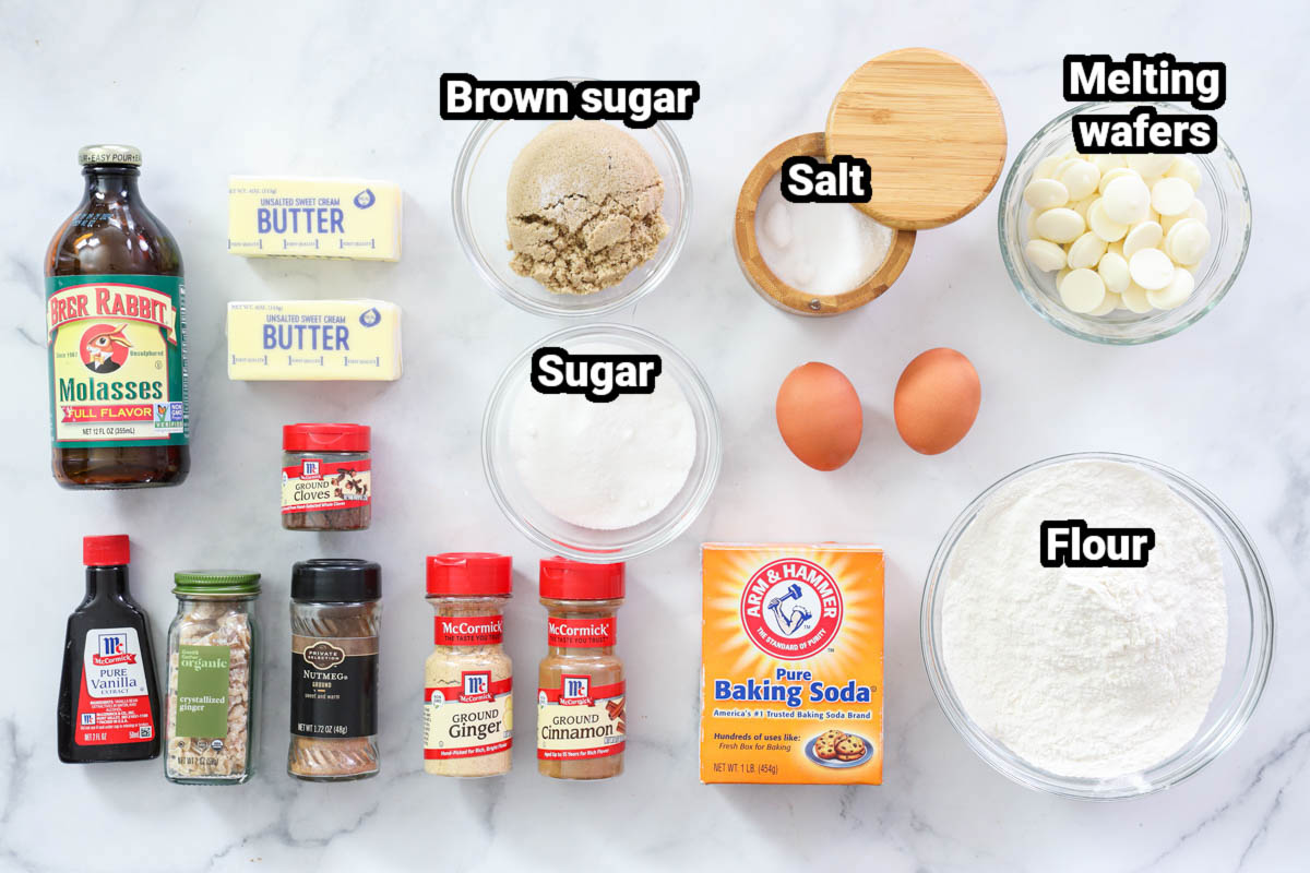 Ingredients for Gingersnap Cookies: flour, baking soda, salt, sugar, brown sugar, eggs, melting wafers, cinnamon, cloves, nutmeg, ginger, candied ginger, vanilla extract, butter, and molasses.