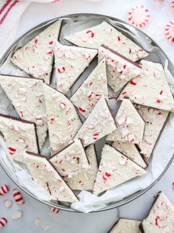 Pile of Peppermint Bark in a silver tin.