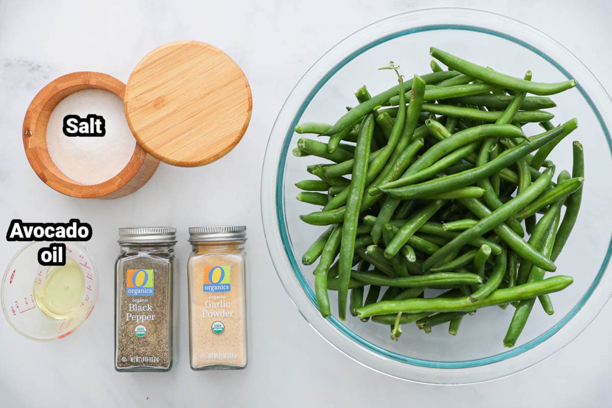 Ingredients for Air Fryer Green Beans: green beans, avocado oil, salt, pepper and garlic powder.