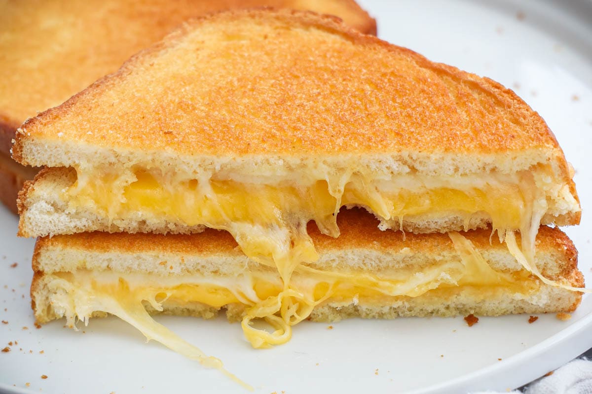 Air Fryer Grilled Cheese sandwiches cut in half