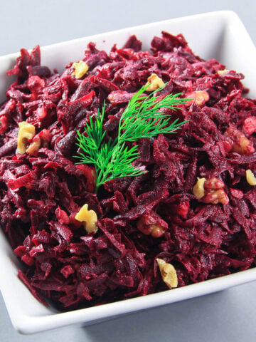 Russian Beet Salad in a white bowl.