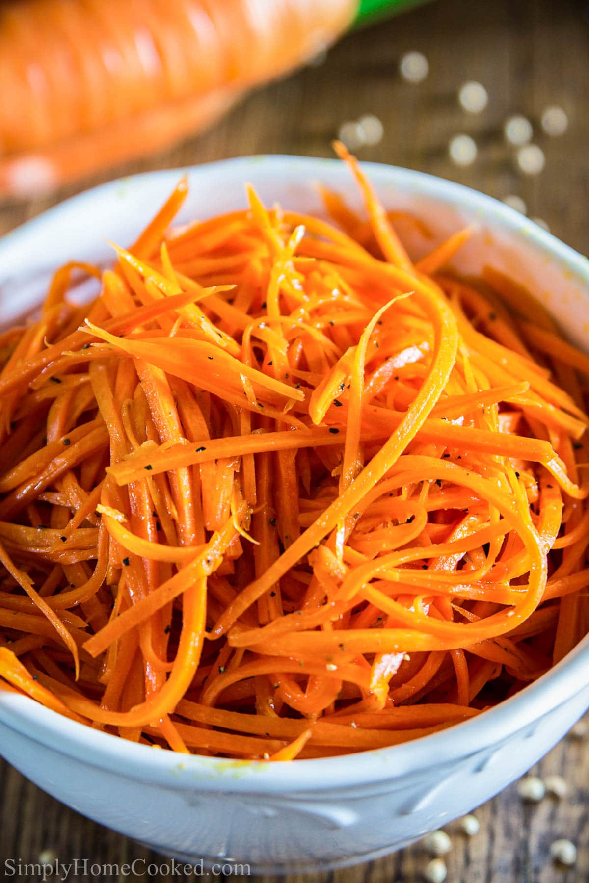 Shredded Carrot Salad in a white bowl