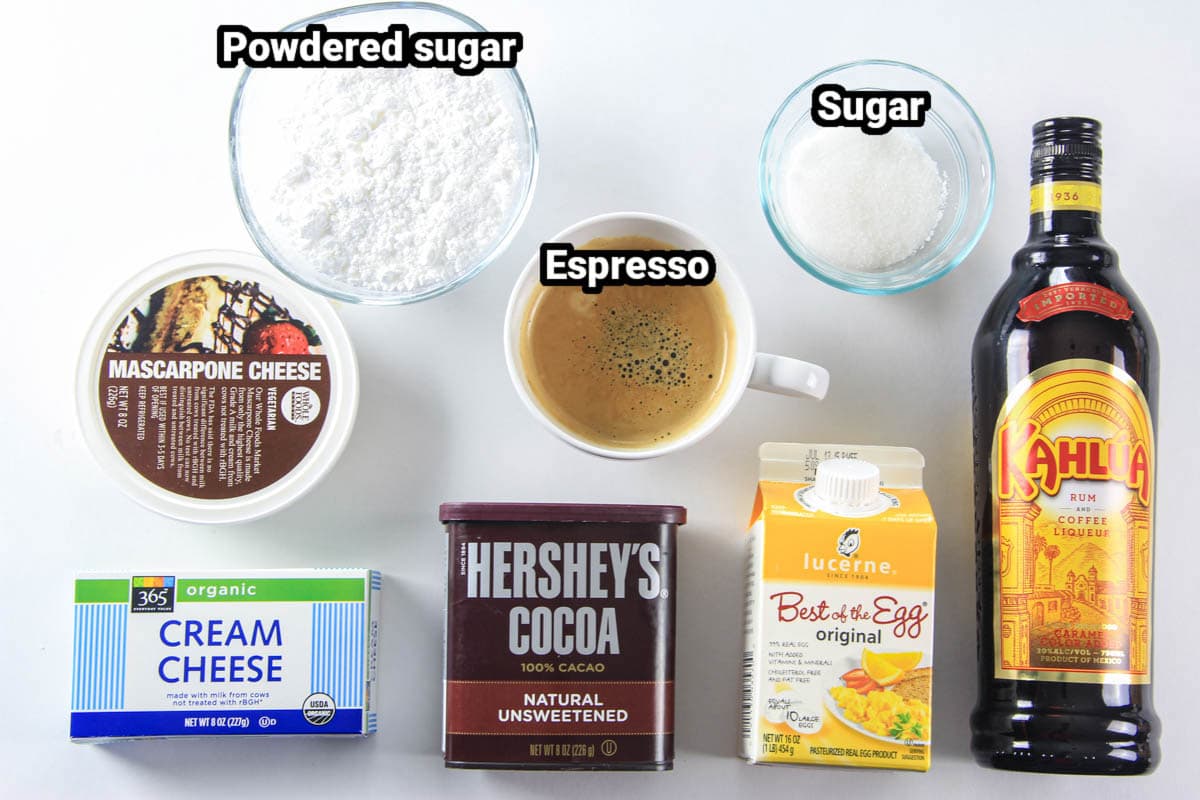 Ingredients for Tiramisu Cake: powdered sugar, espresso, sugar, kahlua, mascarpone cheese, cream cheese, cocoa powder, and egg product.