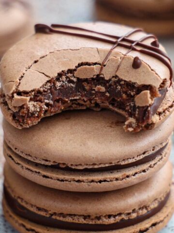 Stack of Chocolate Macarons with a ganache filling