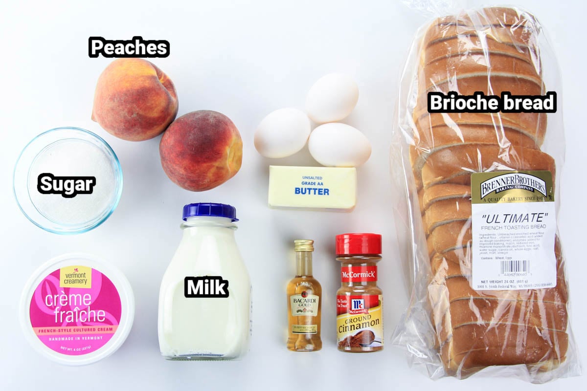Ingredients for Peach French Toast: Brioche bread, eggs, butter, cinnamon, sugar, rum, milk, peaches and creme fraiche.