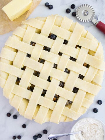 Blueberry Pie in a homemade pie crust with a lattice top.