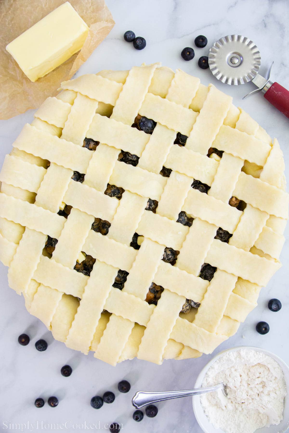 Blueberry Pie in a homemade pie crust with a lattice top.