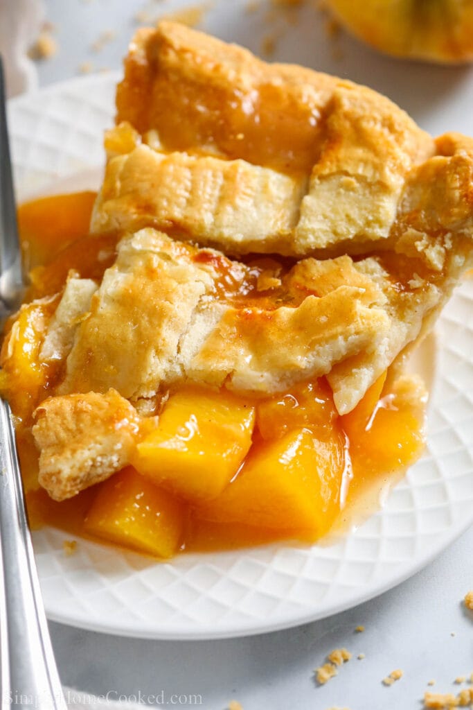 Close up of a slice of Perfect Peach Pie. 