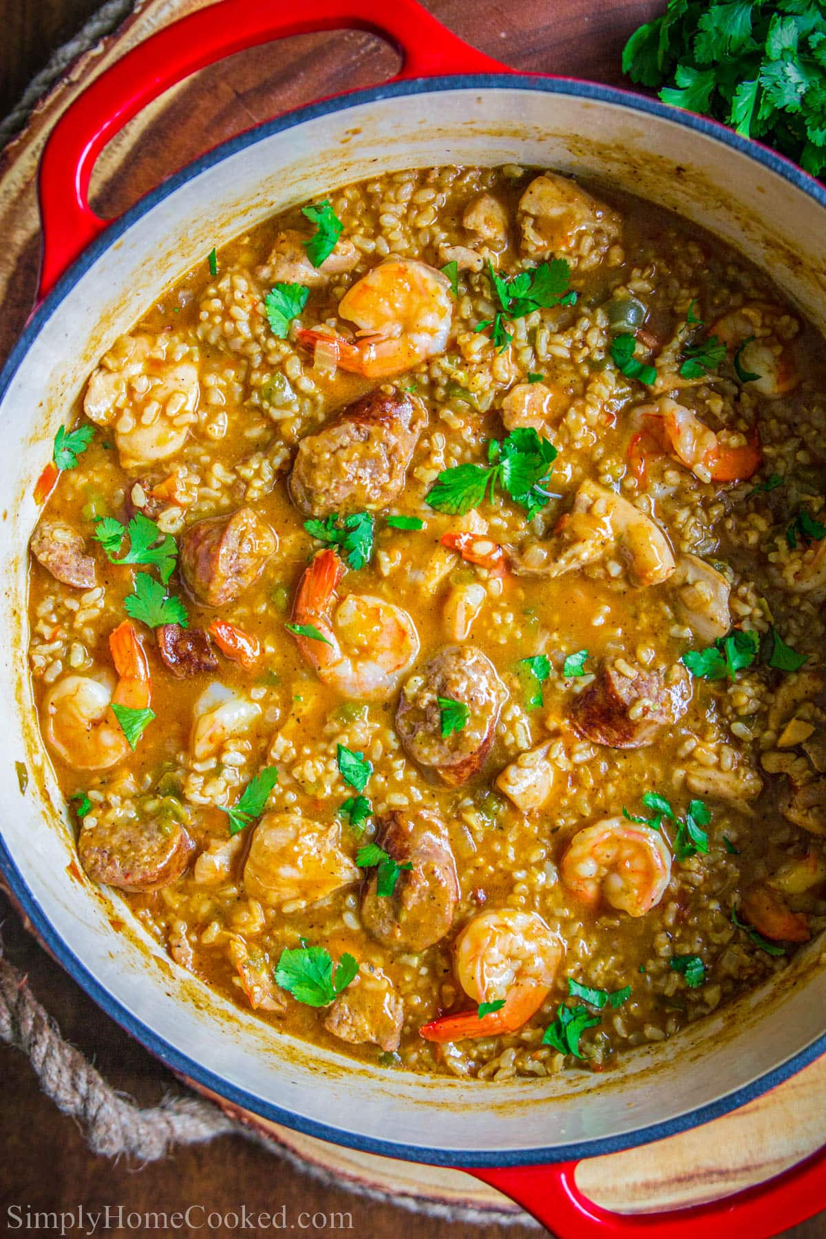 Dutch oven pot full of Brown Rice Jambalaya.